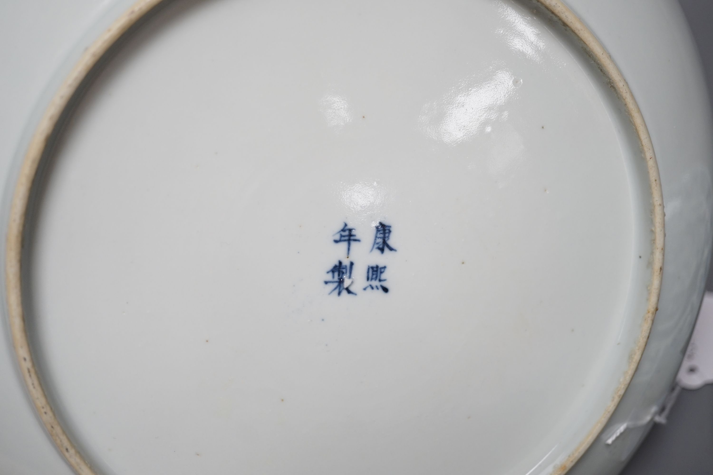 A pair of Chinese blue and white ‘dragon’ dishes, Qing dynasty, 27cm diameter